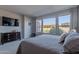 Main bedroom with ample natural light and dresser at 86 E Iloca Ln, Queen Creek, AZ 85140