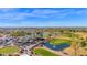 Aerial view of golf course, clubhouse, and surrounding area at 8700 E University Dr # 3505, Mesa, AZ 85207