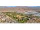 Aerial view of community with golf course and homes at 8700 E University Dr # 3505, Mesa, AZ 85207