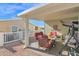 Covered patio with seating area, perfect for outdoor relaxation at 8700 E University Dr # 3505, Mesa, AZ 85207