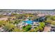 Resort-style pool with palm trees and lounge areas at 8700 E University Dr # 3505, Mesa, AZ 85207