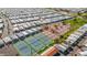 Aerial view of community tennis courts and homes at 8700 E University Dr # 3505, Mesa, AZ 85207