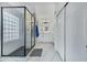 Modern bathroom with a large walk-in shower and white cabinetry at 8740 W Bloomfield Rd, Peoria, AZ 85381