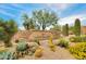 Monument community entrance with desert landscaping at 9580 E Southwind Ln, Scottsdale, AZ 85262