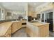 Spacious kitchen with light wood cabinets and an island at 9580 E Southwind Ln, Scottsdale, AZ 85262