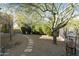 Landscaped side yard with stepping stones and large pot at 9580 E Southwind Ln, Scottsdale, AZ 85262