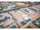 Aerial view of house with pool and solar panels at 10053 E Seismic Ave, Mesa, AZ 85212