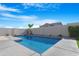 Home with a refreshing pool and grassy backyard at 10053 E Seismic Ave, Mesa, AZ 85212