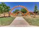 Orange playground structure with unique design at 10053 E Seismic Ave, Mesa, AZ 85212