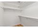 Bright, spacious closet with hanging rods and shelves at 10828 E Flintlock Dr, Sun Lakes, AZ 85248