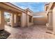 Outdoor patio area with tile floor and a walkway at 10828 E Flintlock Dr, Sun Lakes, AZ 85248