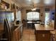 Kitchen boasts stainless steel appliances and an island at 11433 E Peterson Ave, Mesa, AZ 85212