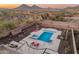 Luxury backyard oasis with a large pool and spa at 11842 W Creosote Dr, Peoria, AZ 85383