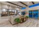 Living room with fireplace, built-in shelving, and sliding doors to backyard at 11842 W Creosote Dr, Peoria, AZ 85383