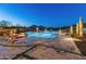 Luxury backyard oasis featuring a sparkling pool and mountain views at 11842 W Creosote Dr, Peoria, AZ 85383