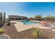 Resort-style pool and spa with lounge chairs at 11842 W Creosote Dr, Peoria, AZ 85383