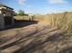 Spacious backyard with gravel and block wall fencing at 12221 N 122 Dr, El Mirage, AZ 85335