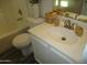 Clean bathroom with white vanity, single sink, and shower/tub combo at 12221 N 122 Dr, El Mirage, AZ 85335