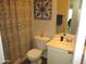 Bathroom with shower/tub, white vanity, and decorative accents at 12221 N 122 Dr, El Mirage, AZ 85335