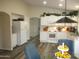 Spacious kitchen with white cabinets and modern appliances at 12221 N 122 Dr, El Mirage, AZ 85335