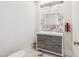 Modern powder room with marble accents and sleek vanity at 13645 E Columbine Dr, Scottsdale, AZ 85259