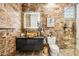 Spa-like bathroom with a wood vessel sink, modern fixtures and designer tile at 13645 E Columbine Dr, Scottsdale, AZ 85259