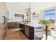 Modern kitchen with island and high-end appliances at 13645 E Columbine Dr, Scottsdale, AZ 85259