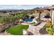 Expansive backyard oasis with a beautiful pool and patio area at 13645 E Columbine Dr, Scottsdale, AZ 85259