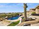 Resort-style pool and spa with a large patio and mountain views at 13645 E Columbine Dr, Scottsdale, AZ 85259