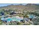 Aerial view of community pool, clubhouse, and landscape at 1536 W Blaylock Dr, Phoenix, AZ 85085