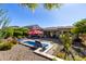 Landscaped backyard with a pool and patio area at 1536 W Blaylock Dr, Phoenix, AZ 85085