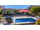 Spacious backyard oasis with a pool, patio, and fire pit at 1536 W Blaylock Dr, Phoenix, AZ 85085