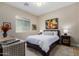 Cozy bedroom with a queen-size bed and ample closet space at 1536 W Blaylock Dr, Phoenix, AZ 85085