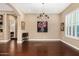 Bright dining room with hardwood floors and a chandelier at 1536 W Blaylock Dr, Phoenix, AZ 85085