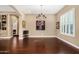 Formal dining room with hardwood floors and a chandelier at 1536 W Blaylock Dr, Phoenix, AZ 85085