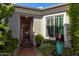 Inviting front entrance with landscaping and a water feature at 1536 W Blaylock Dr, Phoenix, AZ 85085