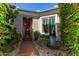 Inviting front entrance with landscaping and a water feature at 1536 W Blaylock Dr, Phoenix, AZ 85085