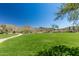 Expansive greenbelt with a walking path and mountain views at 1536 W Blaylock Dr, Phoenix, AZ 85085