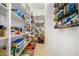 Well-organized pantry with ample shelving for food storage at 1536 W Blaylock Dr, Phoenix, AZ 85085