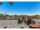 Relaxing patio with seating area overlooking a playground and pool at 1536 W Blaylock Dr, Phoenix, AZ 85085