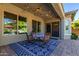 Covered patio with string lights and outdoor seating at 1536 W Blaylock Dr, Phoenix, AZ 85085