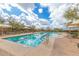 Community lap pool with plenty of lounge chairs at 1536 W Blaylock Dr, Phoenix, AZ 85085