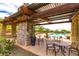 Community pool with covered seating and tables at 1536 W Blaylock Dr, Phoenix, AZ 85085