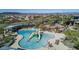 Community pool with water features and a play area at 1536 W Blaylock Dr, Phoenix, AZ 85085