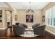 Elegant sitting area featuring a chandelier and comfortable seating at 1536 W Blaylock Dr, Phoenix, AZ 85085