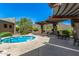 Community hot tub with seating and a pergola at 1536 W Blaylock Dr, Phoenix, AZ 85085