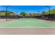 Community tennis court with a well-maintained surface at 1536 W Blaylock Dr, Phoenix, AZ 85085