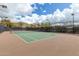 Well-maintained tennis court with surrounding fence at 1536 W Blaylock Dr, Phoenix, AZ 85085