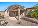 Backyard patio with pergola and gravel landscaping at 15653 W Monterey Way, Goodyear, AZ 85395