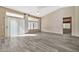 Living room with sliding door to the backyard at 15653 W Monterey Way, Goodyear, AZ 85395